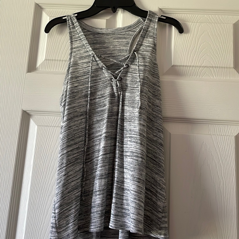 Light grey and whitish Hollister size small tank top with the cross strings
